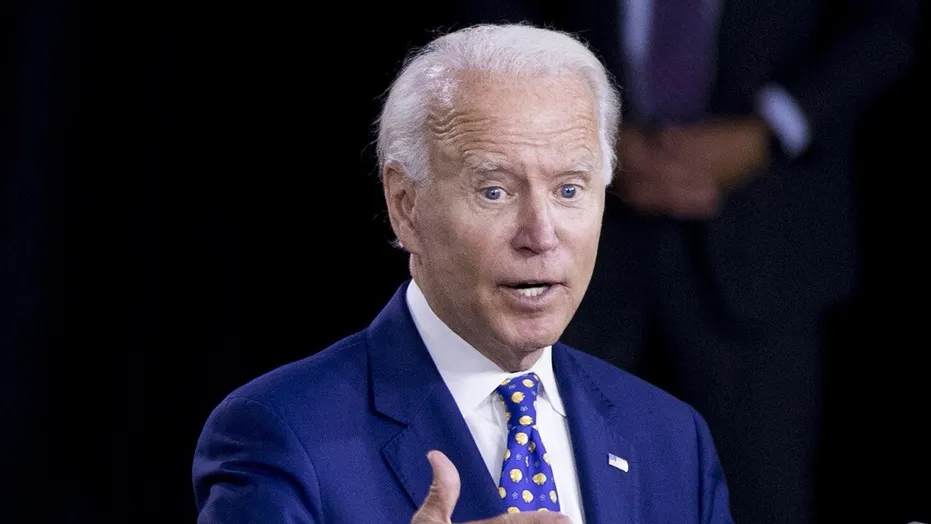 Biden's geriatric drool has been edited out of existence with Photoshop.